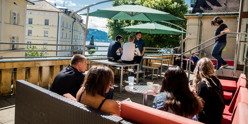 Students relaxing on the school balcony