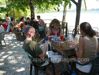 Students having lunch on the beach