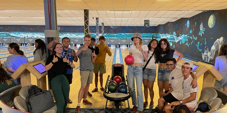 Young students bowling activity