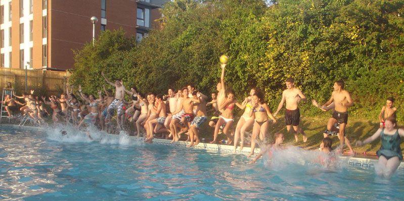 Having fun in the outdoor swimming pool
