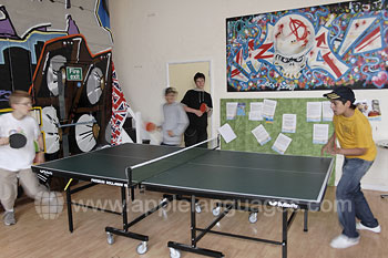 Students playing table tennis