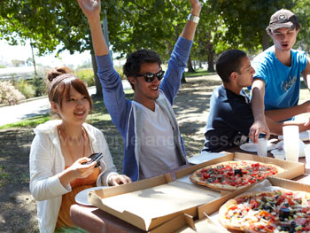 Eating pizza in the park