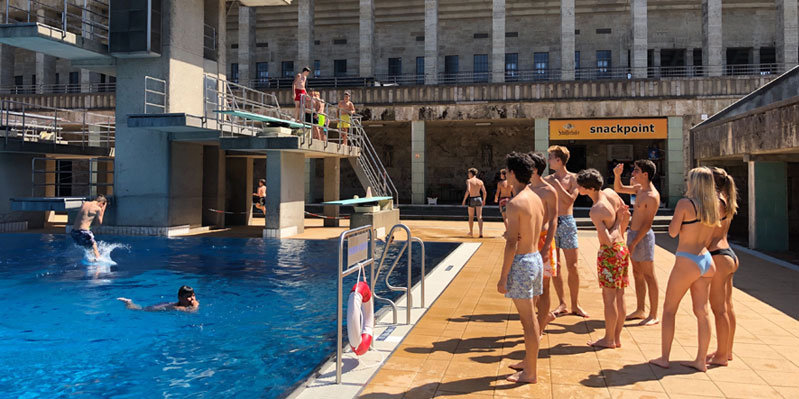 Students in the famous Olympic Stadium, next door to the campus