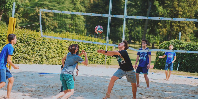 Playing volleyball in the sun